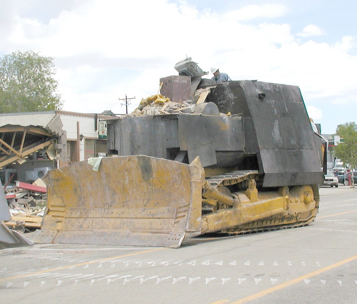 The Killdozer smashed through Granby town hall on June 4, 2004 — Heapio