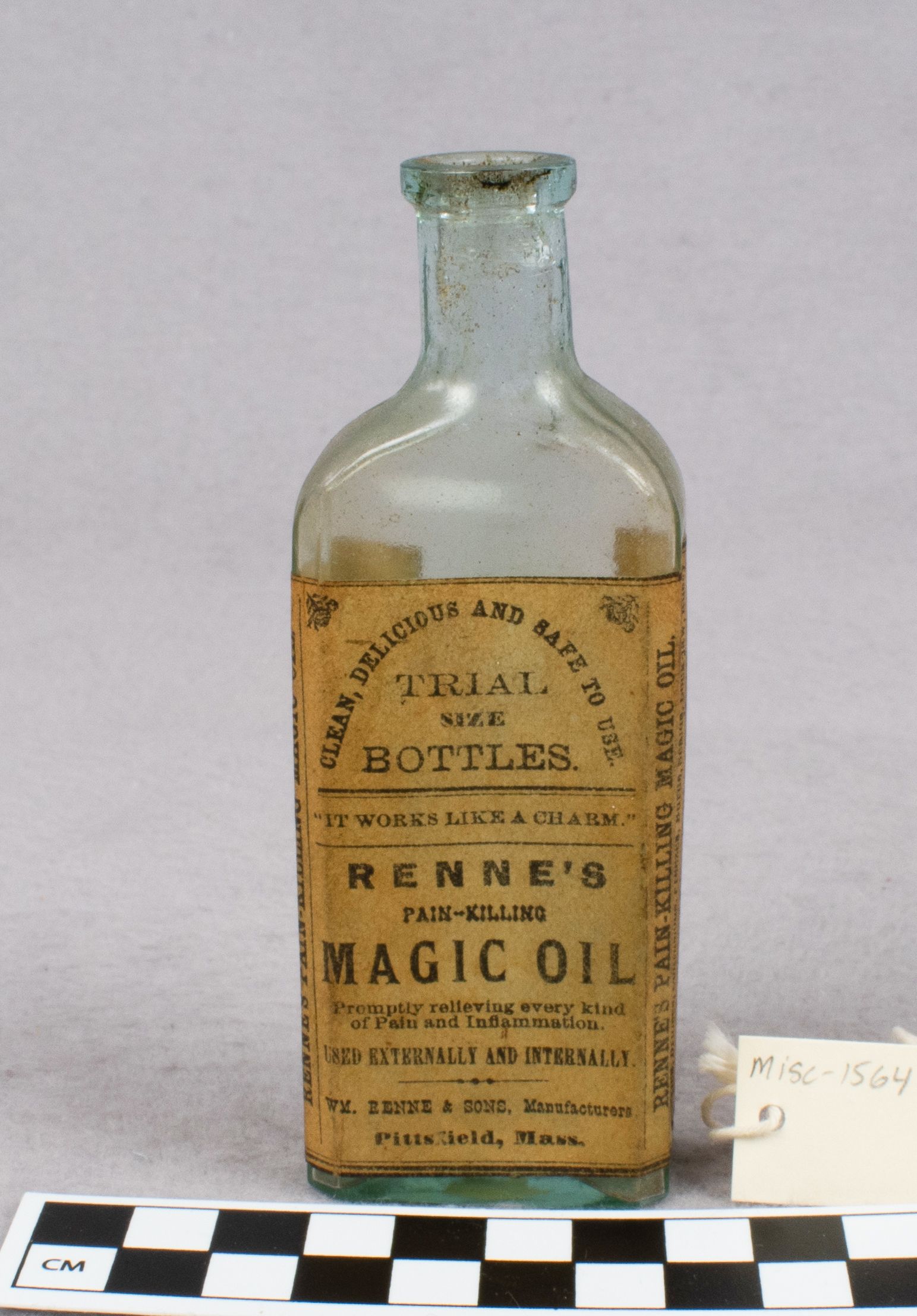 Antique patent medicine bottle with skull and crossbones label — Heapio